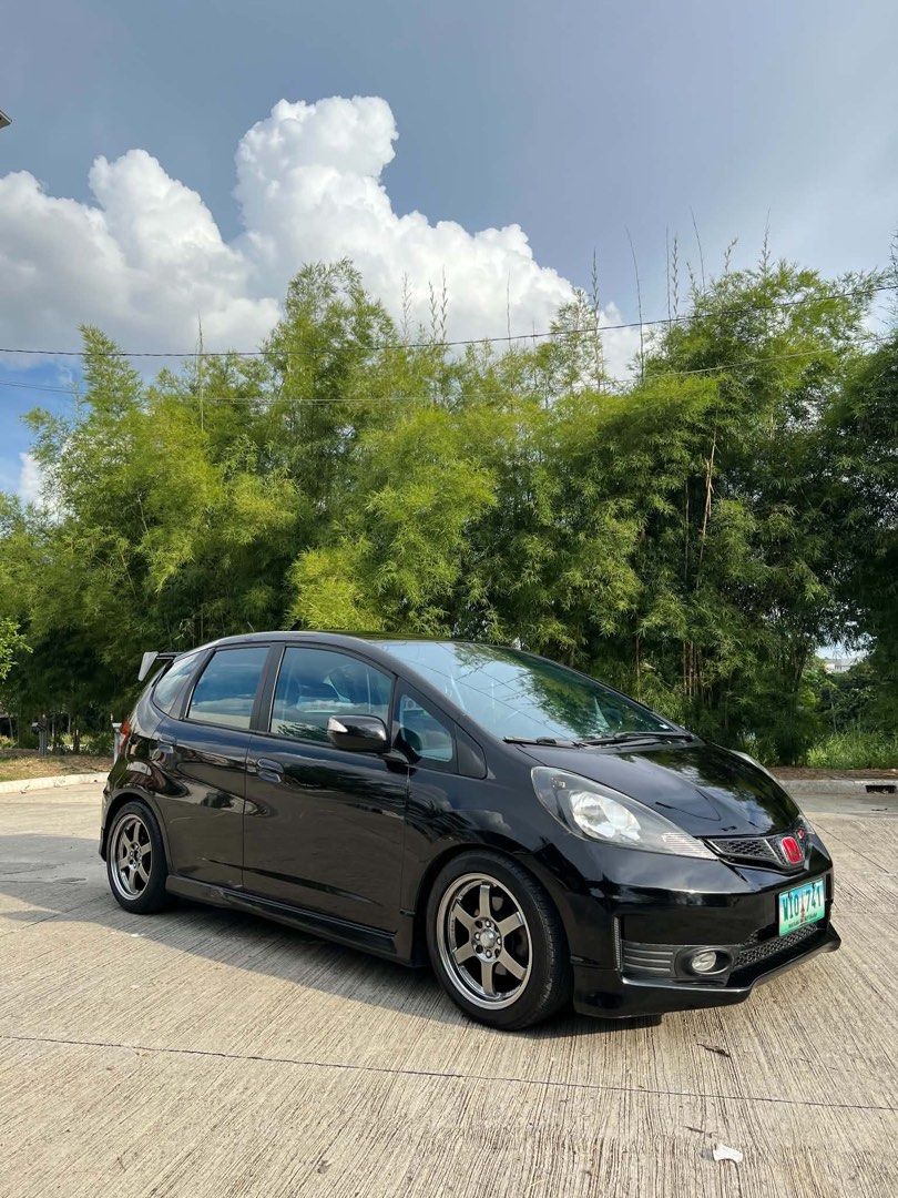 Honda Jazz 1.5 RS Hatchback (A) (Category: Used Cars) located in Manila. Submitted by kwekwekwek (Listing ID 1466308703, Image 3). Description: Honda Jazz 2013 RS Orig mmc Top of the line Paddle Shifter Pristine condition 1.5L engine Automatic Transmission 4 wheel disc brakes Fuel efficient 82k Original Low mileage Casa record Newly PMS honda TE 37 16s mags 90% tires Ceramic tint No issue Complete legal documents Registered Cauayan City Isabela 0