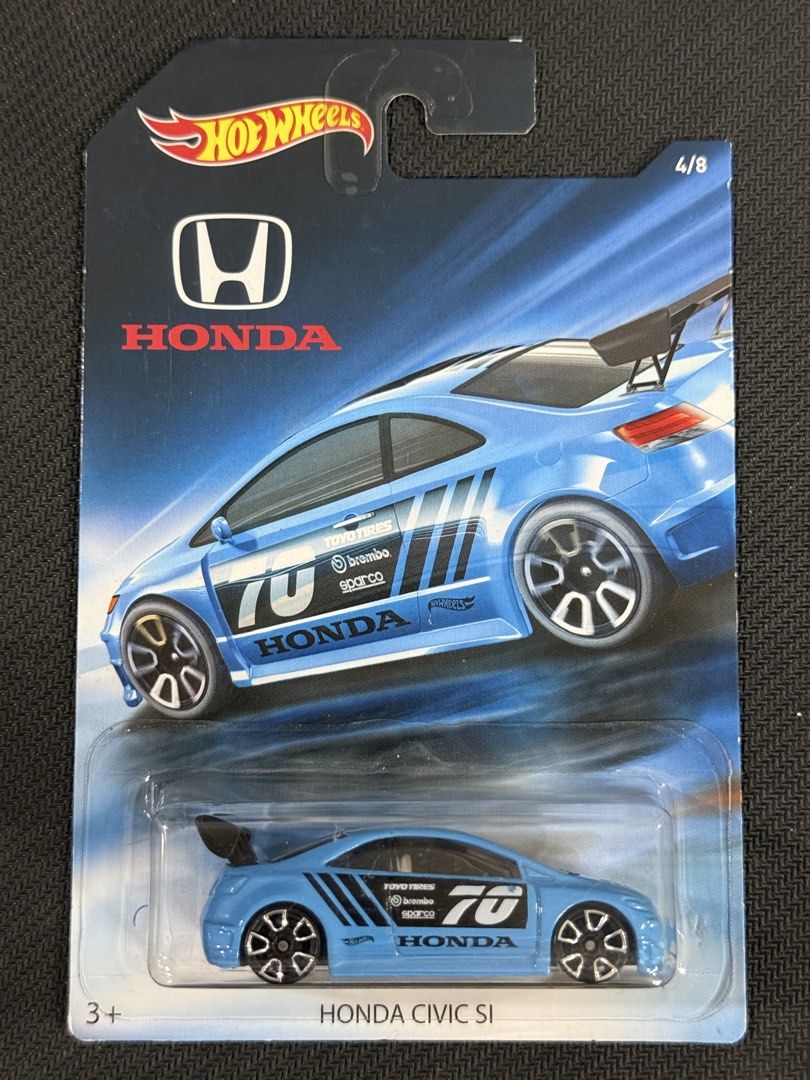 Hot Wheels Honda Civic Si (Category: Vehicle & Diecast Models) located in Muntinlupa City. Submitted by eman_garcia_ (Listing ID 1466205217, Image 1). Description: - Brand: Hot Wheels - Model: Honda Civic Si (Honda Series, 4/8) - Color/Design: Bright blue finish with racing decals, #70 graphics, and black rear wing - Condition: Brand new, unopened original packaging (blister pack and card intact) - Ideal for: JDM miniature car and diecast collect