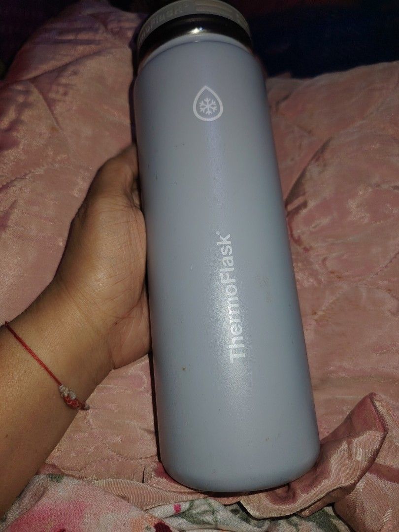 Hydro Flask Water Bottle Blue Grey Black Thermos (Category: Water Bottles & Tumblers) located in Manila. Submitted by purediamond888 (Listing ID 1466307006, Image 2). Description: Three water bottles total in this lot. Dark blue Hydro Flask with standard cap. Grey ThermoFlask featuring a snowflake symbol. Black Thermos Hydration bottle with yellow accents and a carry handle. All three ready for daily hydration needs. Great for gym, office, or out