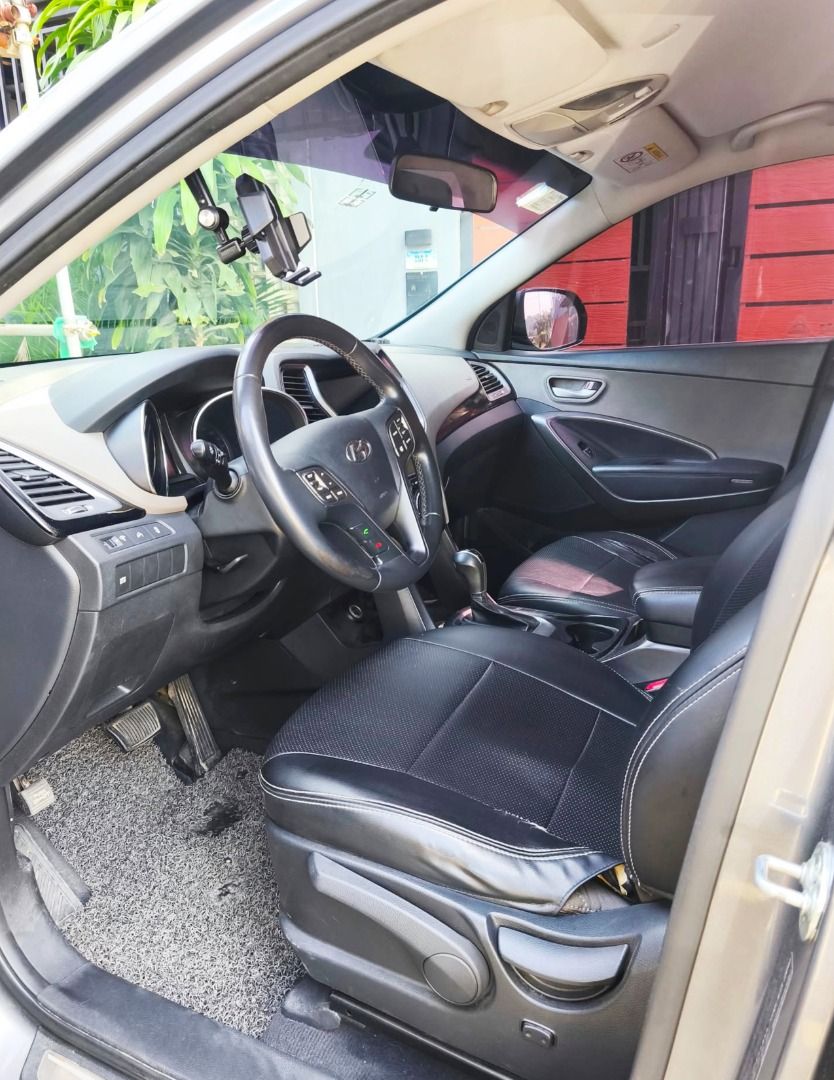 Hyundai Santa Fe CRDI Auto (Category: Used Cars) located in Manila. Submitted by rowj_ (Listing ID 1466174513, Image 2). Description: 2015 Hyundai Santa Fe Diesel A/T Mileage: 117K km 2nd Owner | Push Start Color: Grey | Plate Ending: 2 Transmission: Automatic Condition: Excellent engine, silent suspension (no kalampag), fresh leather interior, cold aircon. Minor issues & small dents from daily use. Papers: Complete/clean documents (CR/OR on hand
