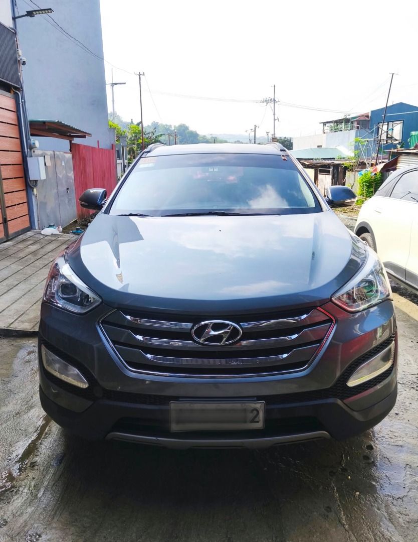 Hyundai Santa Fe CRDI Auto (Category: Used Cars) located in Manila. Submitted by rowj_ (Listing ID 1466174513, Image 1). Description: 2015 Hyundai Santa Fe Diesel A/T Mileage: 117K km 2nd Owner | Push Start Color: Grey | Plate Ending: 2 Transmission: Automatic Condition: Excellent engine, silent suspension (no kalampag), fresh leather interior, cold aircon. Minor issues & small dents from daily use. Papers: Complete/clean documents (CR/OR on hand