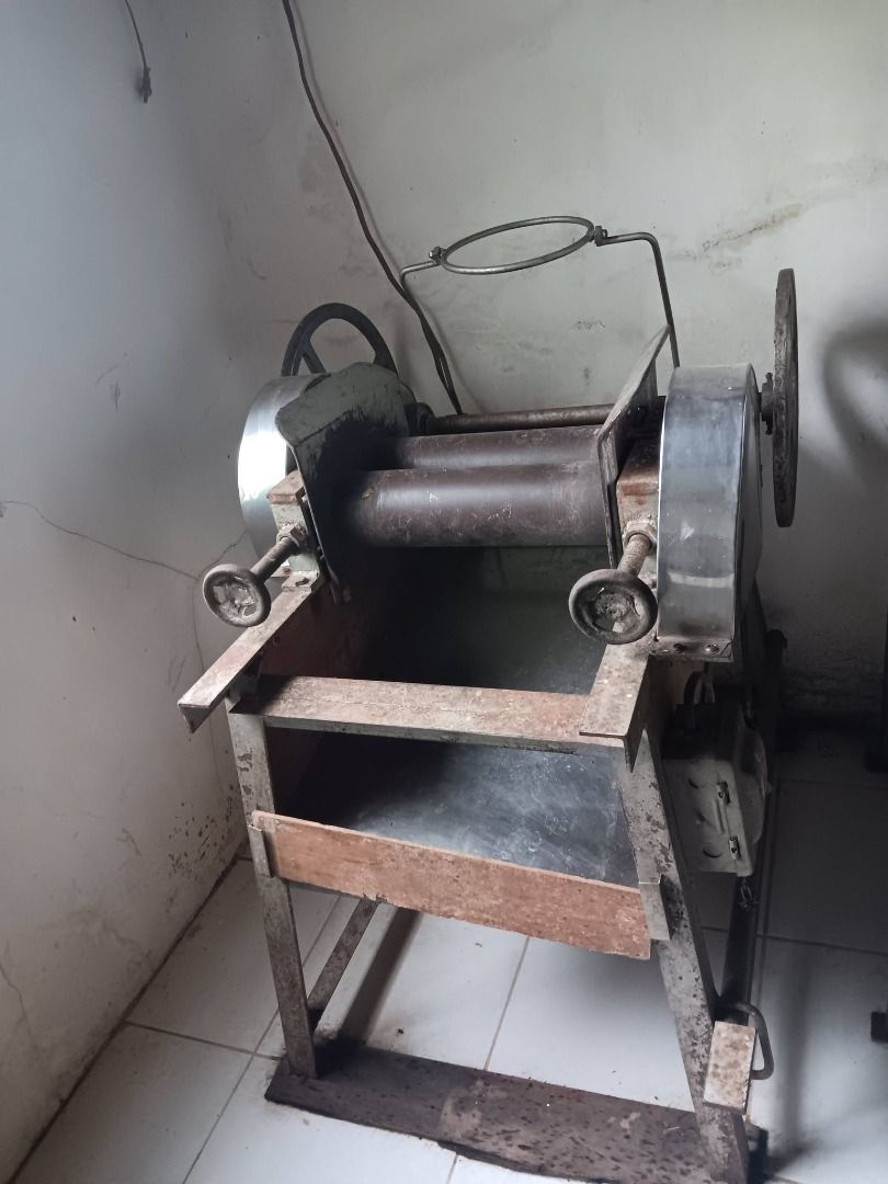 Industrial Heavy Duty Rolling Machine Metal Roller 2HP (Category: Bakeware) located in Makati City. Submitted by mannycollado (Listing ID 1466249859, Image 1). Description: - Heavy-duty with 2HP motor metal rolling machine - Features dual steel rollers and adjustable hand wheels - Mounted on a sturdy metal and wood frame stand - Industrial grade, ideal for metal sheet shaping or bakery dough flattening - Shows visible rust and cosmetic wear from 