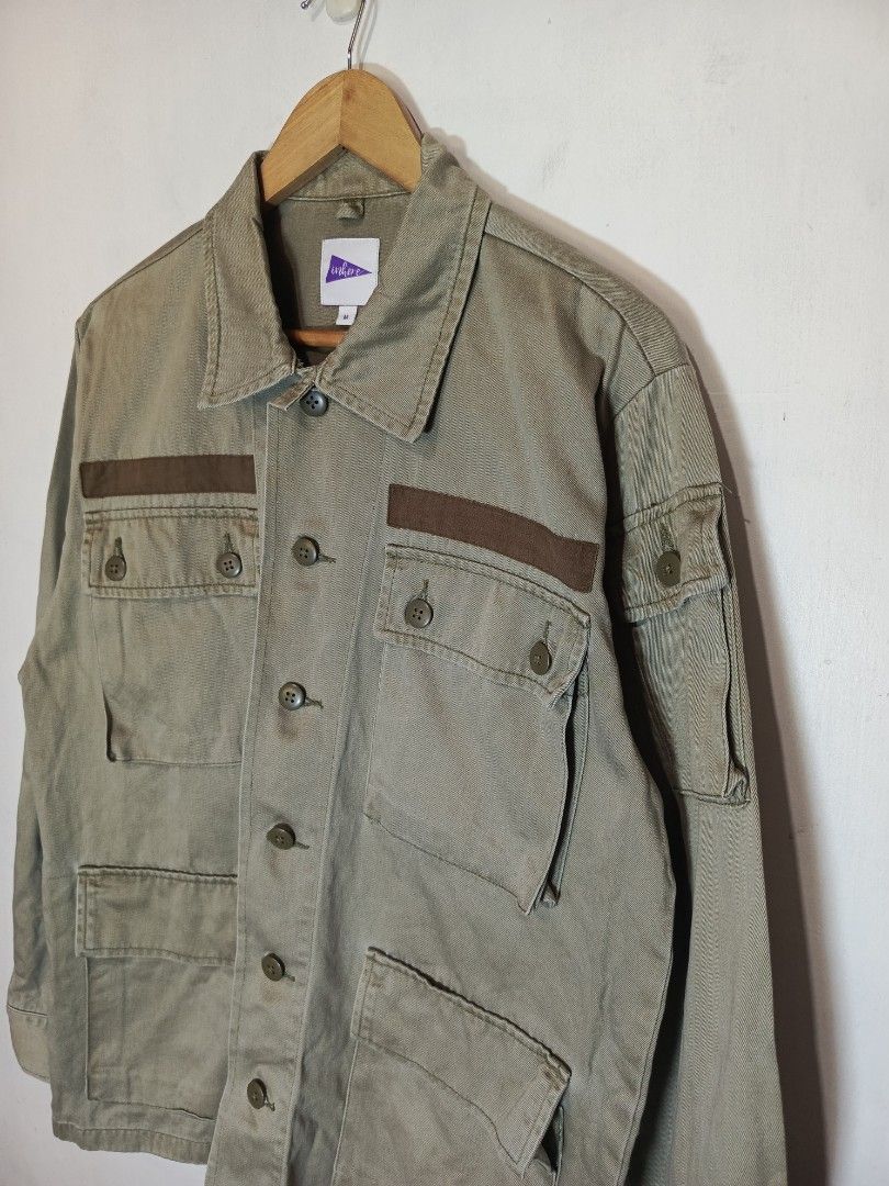 INHERE OLIVE GREEN UTILITY JACKET (Category: Coats, Jackets and Outerwear) located in Baguio. Submitted by 074thriftmania (Listing ID 1466167636, Image 2). Description: - Brand: Inhere - Size: M - Color: Olive green with dark brown contrast panels - Closure: Button-up front - Pockets: Multiple front flap pockets and sleeve pocket with button closure - Details: Structured collar, buttoned cuffs, solid plain back - Style: Great layering piece for c