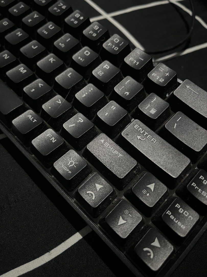 Inplay Black Gaming Keyboard (Category: Computer Keyboard) located in Subic. Submitted by ninnooo (Listing ID 1466267495, Image 2). Description: - Brand/Model: Inplay compact keyboard - Color: Black - Layout: Standard compact layout (numbers accessible via function keys) - Condition: Fully working for typing and gaming; has minor dust from storage and needs a quick wipe down - Connectivity: Wired via attached cable - Fulfillment: Ready to ship or