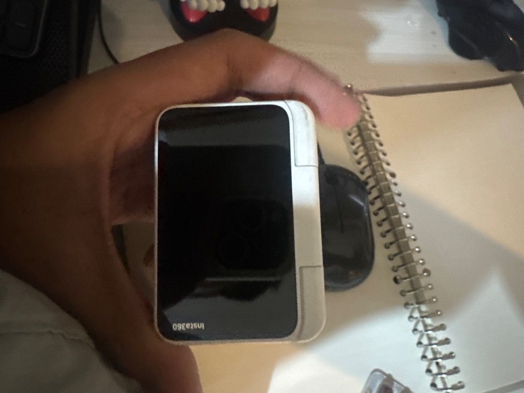 Insta360 GO Ultra action camera compact vlog camera (Category: Cameras) located in Caloocan City. Submitted by oddlion.899135 (Listing ID 1466235810, Image 2). Description: - Model: Insta360 GO Ultra compact white action camera - Condition: Powers up fine, minor signs of handling near the edges - Portability: Handheld, pocket-sized, easy to carry for daily vlogs and trips - Design: Round protruding lens with a small indicator light and mic grill 
