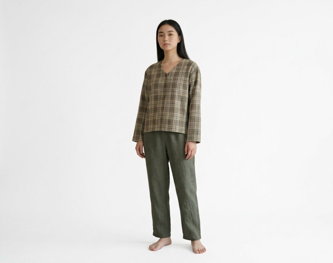 Intique Green Brown Plaid Button Up Blouse Top (Category: Blouses) located in San Juan City. Submitted by marie_d_r (Listing ID 1466251634, Image 1). Description: - Brand: Intique - Pattern: Green and brown plaid - Neckline: V-neck with front brown buttons - Sleeves: Long sleeves with adjustable tie-string cuffs - Fit: Lightweight and comfortable fabric - Condition: Excellent pre-loved condition (ready to wear!).