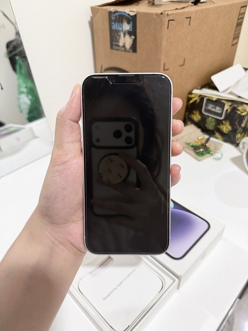 Iphone 14 256GB (Purple) (Category: iPhone 14 Series) located in Urdaneta. Submitted by jullianneysabella (Listing ID 1466312918, Image 3). Description: -256 GB -76% BH -Minor dents -No orig charger and box included (Box has stains on it but I can bring if needed) (Replacement charger BAVIN brand) -No issues and no repair history.