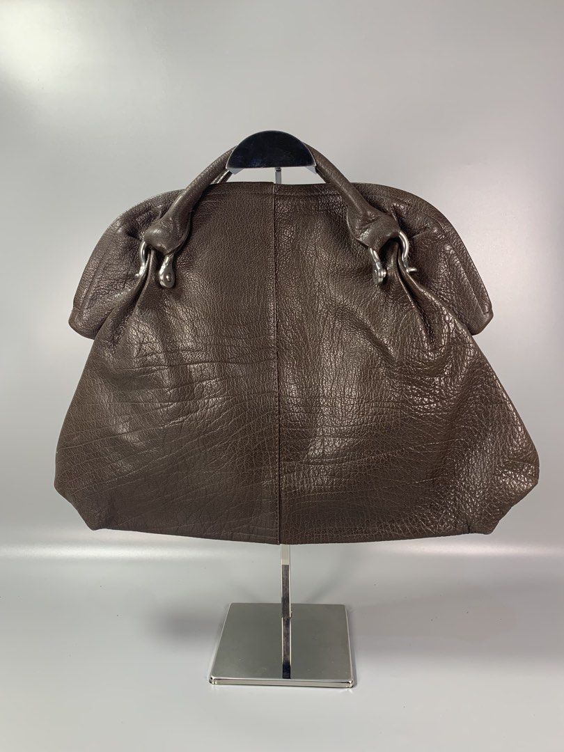 Issey Mikaye Accessory Leather handbag (Category: Belt bags, Clutches and Pouches) located in Mabalacat. Submitted by vtgmalan (Listing ID 1466301818, Image 1). Description: Brand :Issey Miyake Accessory Leather HandBag Price: 7.800 Condition : Excellent Condition Product Condition Rank : AB Issue/s : Minor rubs Dimensions : 17 x 12 x 5 (LxHxW) Inclusions: Shipping Fee Shoulder By Buyer Note : Please make sure to check all the photos before mine.