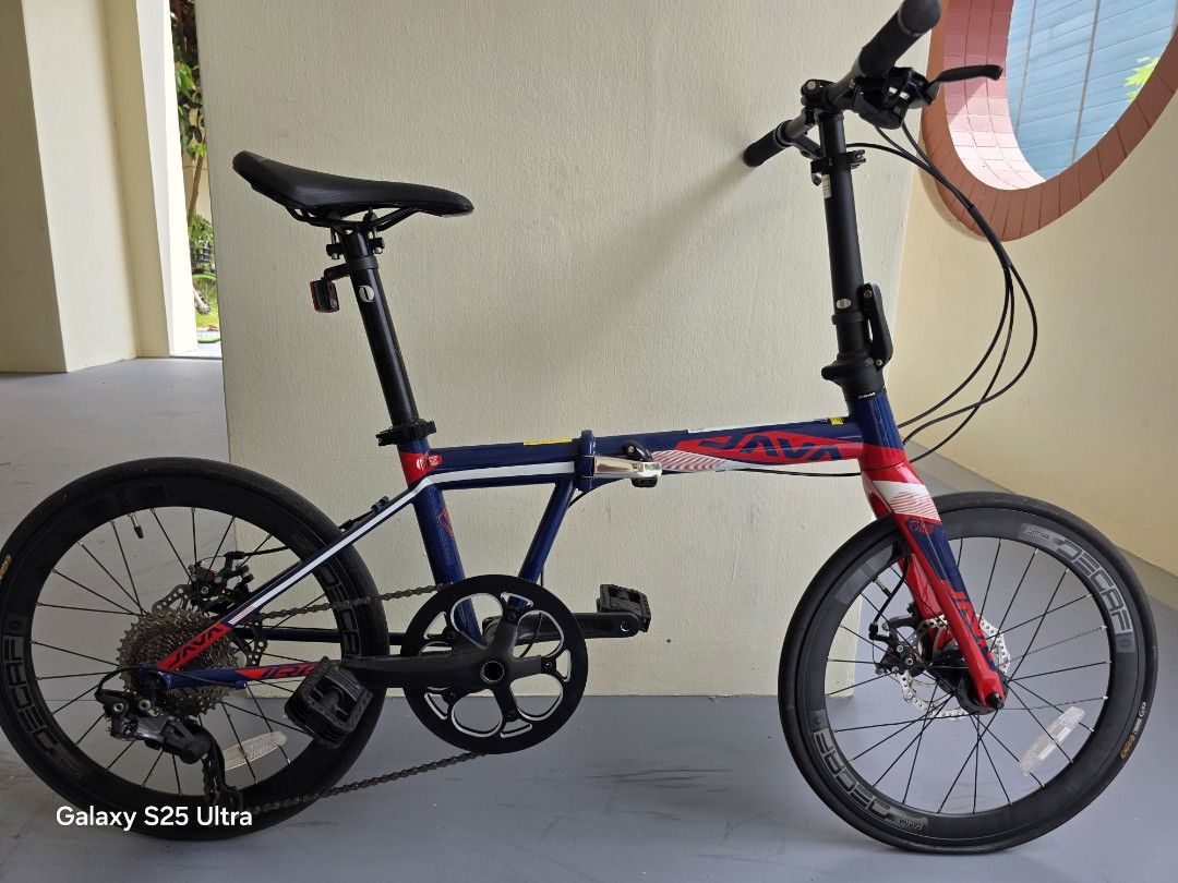 Java foldable bike (Category: Bicycles) located in Singapore. Submitted by lkswee784 (Listing ID 1466233872, Image 2). Description: java foldable bike,aluminum body, wheels 20",Shimano Deore shifter and derailleur, disc brakes, only used a few times, condition like new,I can't get use of small bike so decided to sell it.