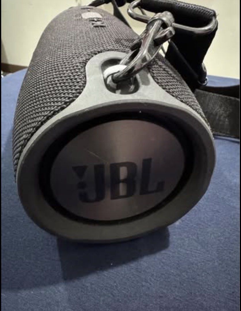 JBL Xtreme 2 Portable Bluetooth Speaker with Strap (Category: Soundbars, Speakers & Amplifiers) located in Cavite. Submitted by marcuz1316 (Listing ID 1466254248, Image 1). Description: JBL Xtreme 2 wireless speaker in dark grey fabric finish. Dual passive radiators on the sides deliver punchy bass and clear audio. Top control panel includes Bluetooth pairing, volume adjustment, power, and playback buttons. Built-in strap loops attached with meta