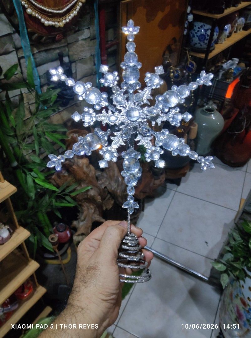 Jeweled Snowflake Christmas Tree Topper (Category: Other Home Decor) located in Valenzuela. Submitted by mighthor0526 (Listing ID 1466214460, Image 1). Description: Measurements on photos provided Good as new, no issue Payment thru Gcash or Abono by Lalamove rider Delivery by rider or shipping will be shouldered by the buyer Pm me if interested .