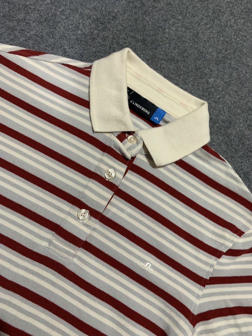 j.lindeberg Patsy 2.0 Field Stripe Polo Shirt (Category: Tshirts & Polo Shirts ) located in Cebu City. Submitted by ninyothrift (Listing ID 1466304901, Image 2). Description: - Brand: J.Lindeberg (Patsy 2.0 Field Stripe) - Size: S - Material: 100% Cotton, Made in Turkey - Design: Red, white, and grey horizontal stripes with contrasting white collar and 3-button placket - Branding: Small embroidered bridge logo on the chest - Condition: Excellent,