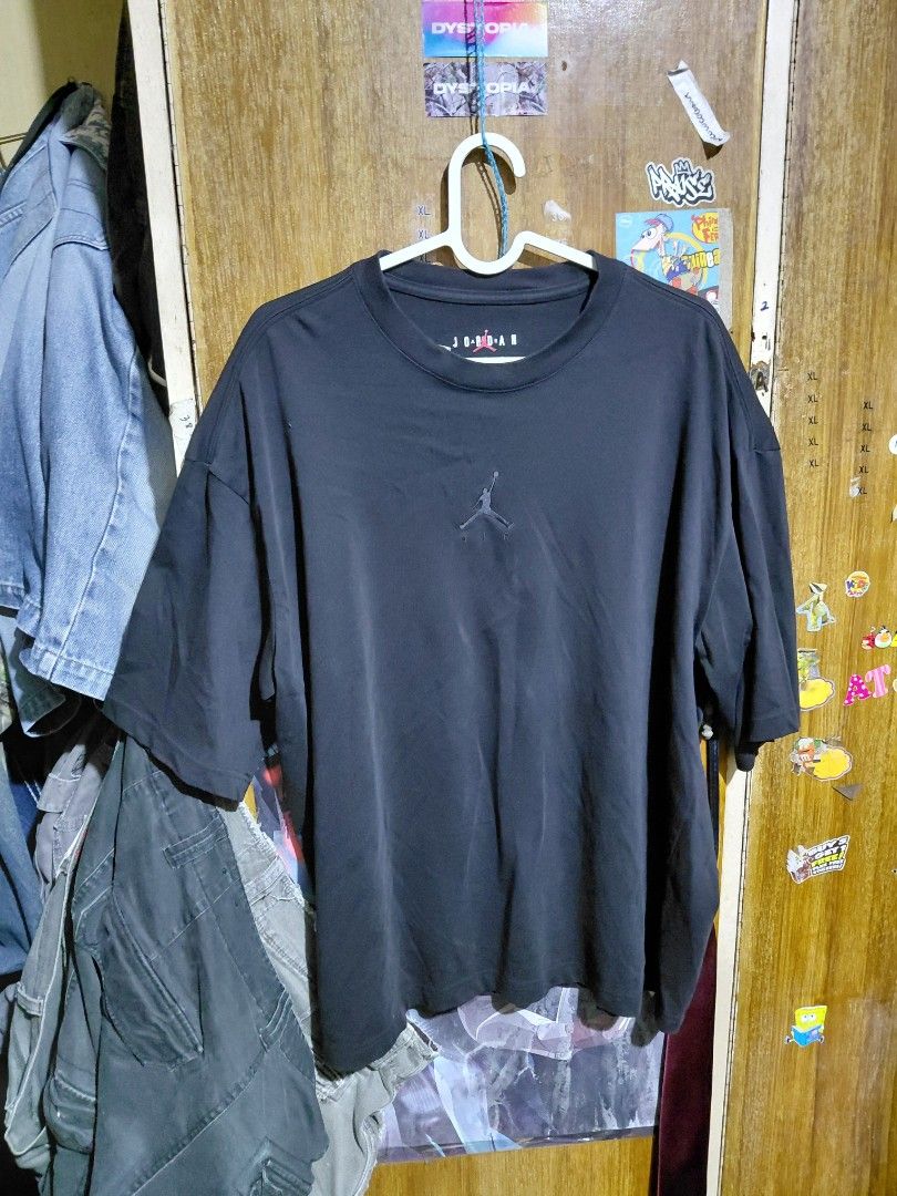 Jordan Black T-Shirt Size L (Category: Tshirts & Polo Shirts ) located in Imus. Submitted by frootiloots4103 (Listing ID 1466313201, Image 1). Description: - Brand: Jordan - Size: L (verified by inner collar tag) - Color: Dark greyish black wash - Design: Short sleeves, crew neck, solid everyday basic - Logo: Subtle embroidered Jumpman logo centered on the chest - Origin: Made in China - Condition: Great quality everyday tee OPEN FOR NEGO (best i