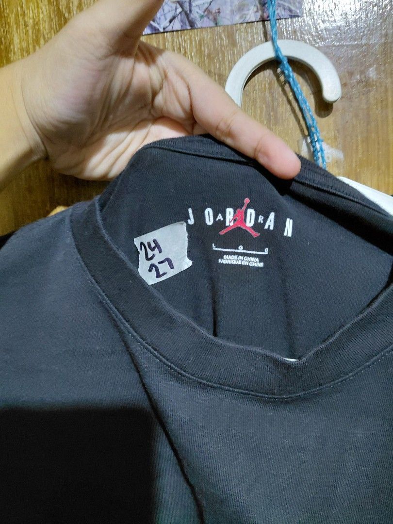 Jordan Black T-Shirt Size L (Category: Tshirts & Polo Shirts ) located in Imus. Submitted by frootiloots4103 (Listing ID 1466313201, Image 2). Description: - Brand: Jordan - Size: L (verified by inner collar tag) - Color: Dark greyish black wash - Design: Short sleeves, crew neck, solid everyday basic - Logo: Subtle embroidered Jumpman logo centered on the chest - Origin: Made in China - Condition: Great quality everyday tee OPEN FOR NEGO (best i