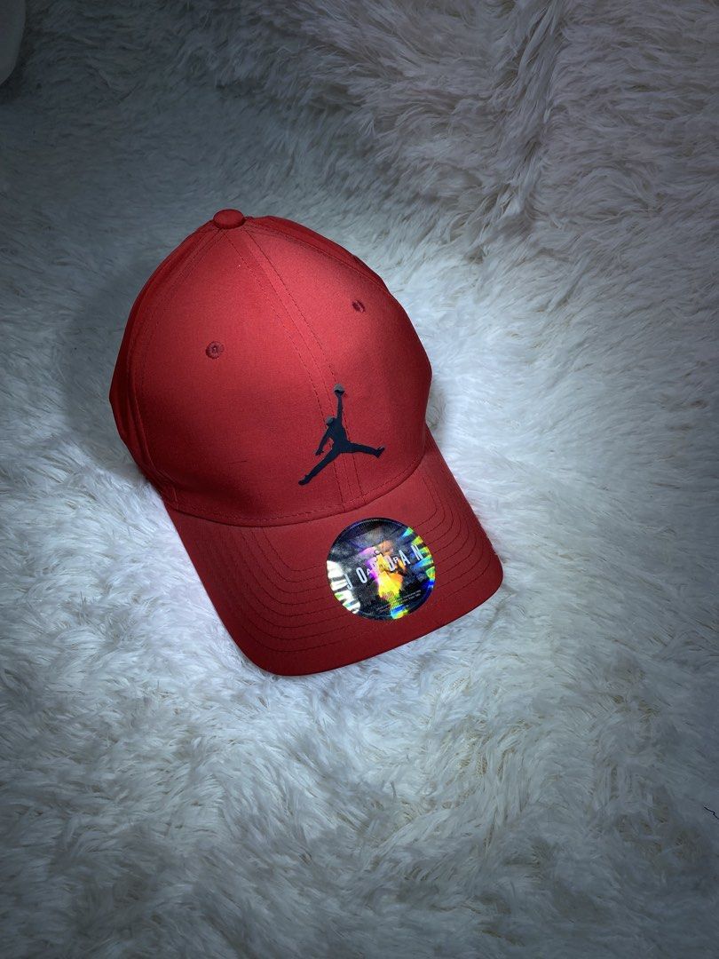 Jordan Jumpman Red Snapback Cap (Category: Caps & Hats) located in Manila. Submitted by arthurmtb25357 (Listing ID 1466221534, Image 1). Description: - 100% Authentic Jordan snapback cap in bright red - Classic black Jumpman embroidered logo on the front - Adjustable snapback closure for a custom fit - Features interior Jordan tape detailing and style code AV8439-687 tags - Original brim sticker still attached - Clean, structured panels and prist