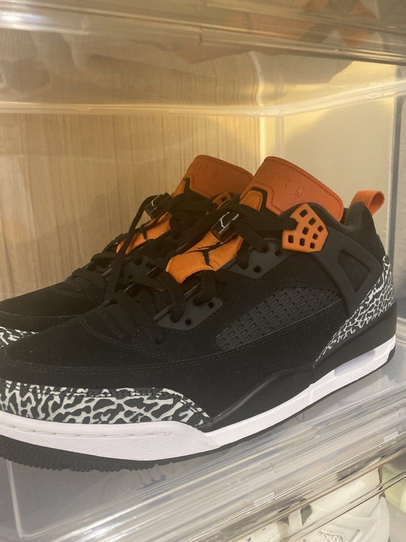 Jordan Spizike Low Black Orange (Category: Sneakers) located in Manila. Submitted by homefindsbyalex (Listing ID 1466300159, Image 1). Description: - Eye-catching black and orange colourway - Iconic elephant print panels on toe and heel - Premium suede upper construction with breathable mesh side panels - Classic lace lock on the front featuring the Jumpman logo - Clean white midsoles for a standout look - Perfect addition to any sneaker collecti