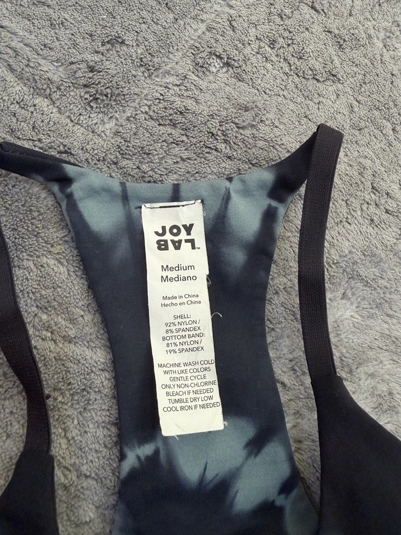 JoyLab Top and Zyia Active Shorts Set (Category: Activewear) located in Manila. Submitted by yeti_it (Listing ID 1466267463, Image 3). Description: - JoyLab Tie-Dye Halter Crop Top: Size Medium, 92% nylon & 8% spandex - Zyia Active Black Utility Shorts: Size Small, 93% polyester & 7% spandex - Shorts feature multiple pockets, front button closure, and cuffed hems - Perfect matching set for workouts or casual athleisure outfits.