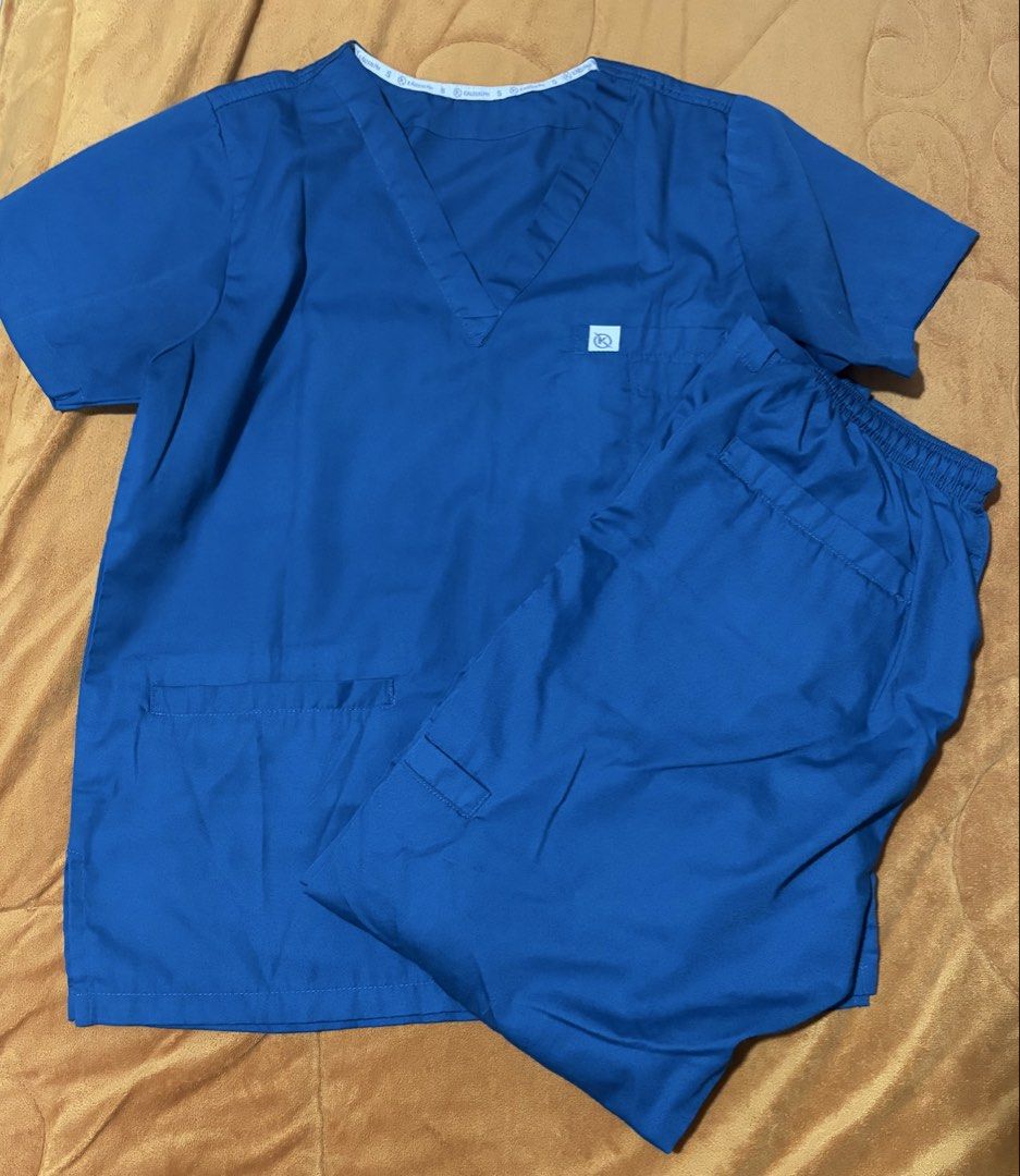 Kaizen Scrub Suit Small (Category: Sets or Coordinates) located in General Santos City (Dadiangas). Submitted by saaradiane08346 (Listing ID 1466301535, Image 1). Description: - Color: Royal blue - Size: Small - Includes: V-neck top with pockets and matching elastic-waistband pants - Condition: Clean, no stains or damage, ready to wear - Ideal for: Daily clinic duties and hospital shifts.