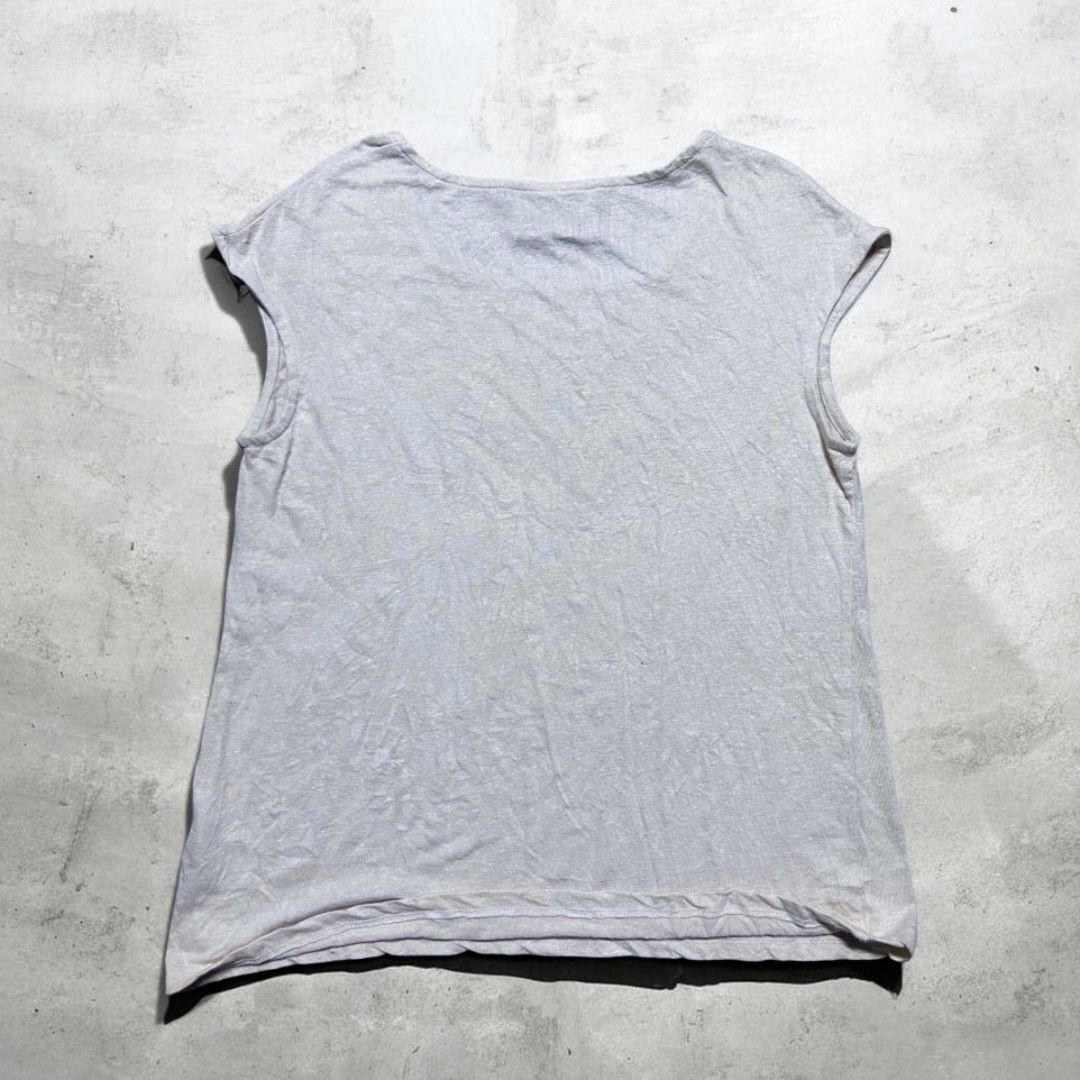 Karl Lagerfeld square-neck capped sleeve top. (Category: Others Tops) located in Sindangan. Submitted by barak_ukay (Listing ID 1465911462, Image 2). Description: Color:light beige / sand / oatmeal color White-22x18 Good condition No issue.