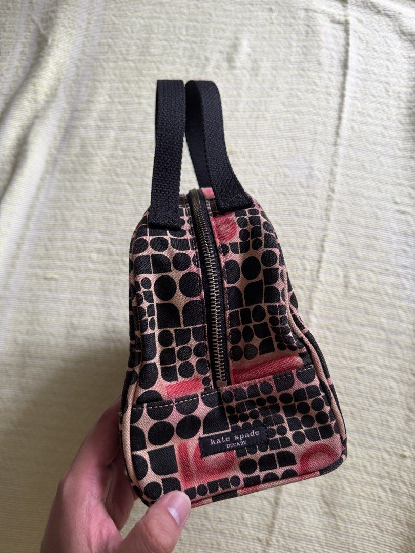 Kate Spade 10th year Anniversary Bag Canvas (Category: Luxury Bags & Wallets) located in Lipa City. Submitted by bagabonds (Listing ID 1466211529, Image 2). Description: - Canvas Material - Bowling Bag look - Observe the pictures closely - Medium size (can be lunch bag) - Red interior .