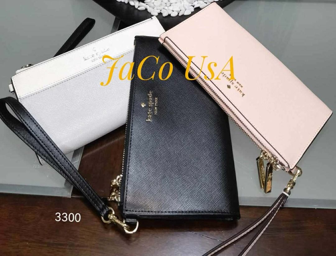 Kate Spade New York Wristlet Wallet (Category: Wallets & Card holders) located in Taytay. Submitted by itsjacousa (Listing ID 1466297946, Image 1). Description: - Brand: Kate Spade wristlet wallets - Available Colors: White (Saffiano leather), Black (Saffiano leather), and Pink (Saffiano leather) - Hardware & Closure: Secure zip-around closure with stylish gold hardware - Convenience: Includes an attached wrist strap for easy carrying - Capacity:
