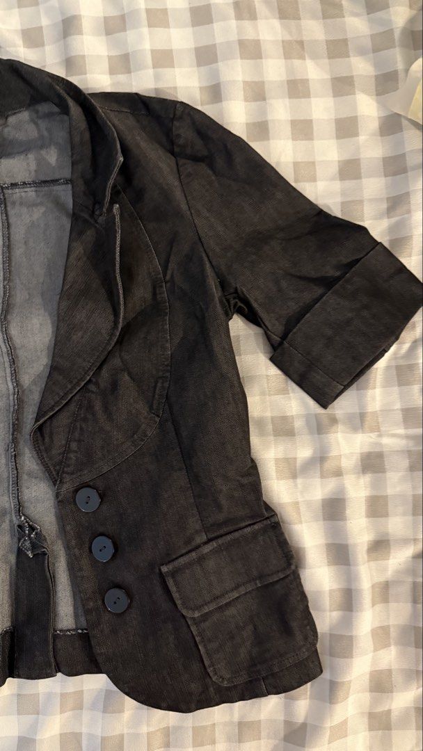 Kenneth Cole Reaction Black Denim Blazer Size 2 (Category: Coats, Jackets and Outerwear) located in Muntinlupa City. Submitted by addielejano (Listing ID 1466267540, Image 2). Description: - Brand: Kenneth Cole Reaction - Style: Dark wash black denim blazer / jacket - Size: Tag 2 - Details: Lapel collar, 3-button front closure, front flap pockets - Sleeves: Short rolled-up sleeves - Interior: Unlined with contrast stitching - Condition: Great cas