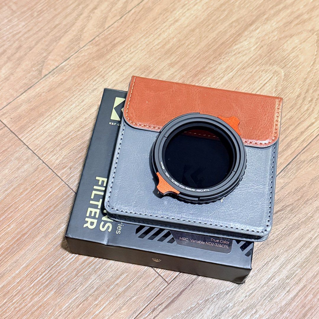 K&F Concept 49mm True Color Variable ND2-32 & CPL Filter (Category: Lens & Kits) located in Paranaque City. Submitted by qwerein (Listing ID 1466203667, Image 1). Description: - Brand: K&F Concept Nano-X Series - Size: 49mm thread - Type: 2-in-1 Variable ND2-32 & CPL filter - Quality: True colors with zero color shift and no cross-polarization issue - Inclusions: Original box and leather storage pouch.