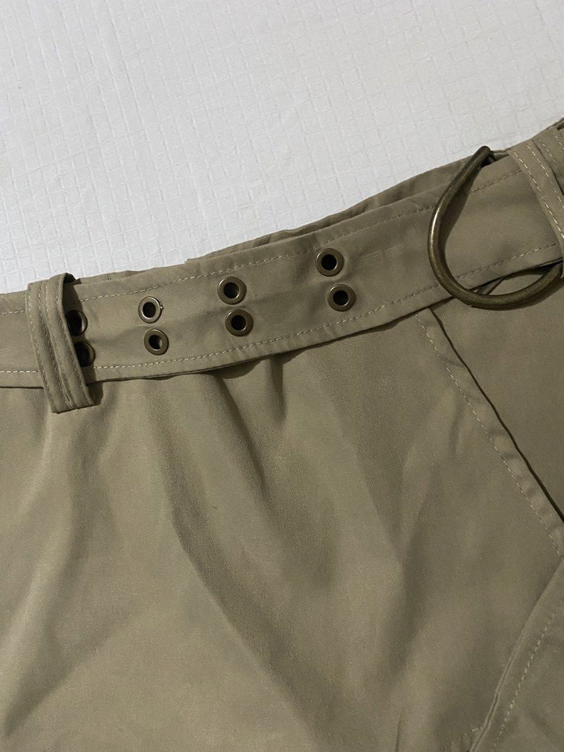 Khaki Belted Skort With D-Ring Buckle (Category: Skirts) located in Quezon City. Submitted by getitrightaway.ph (Listing ID 1466261624, Image 3). Description: - Color: Khaki - Design: High-waist skorts with attached wrap skirt panel - Security: Built-in shorts underneath (no wardrobe malfunction worries!) - Details: Includes matching belt with metal eyelets and D-ring buckle - Material: Smooth, super comfortable fabric - Styling: Easy to match wi