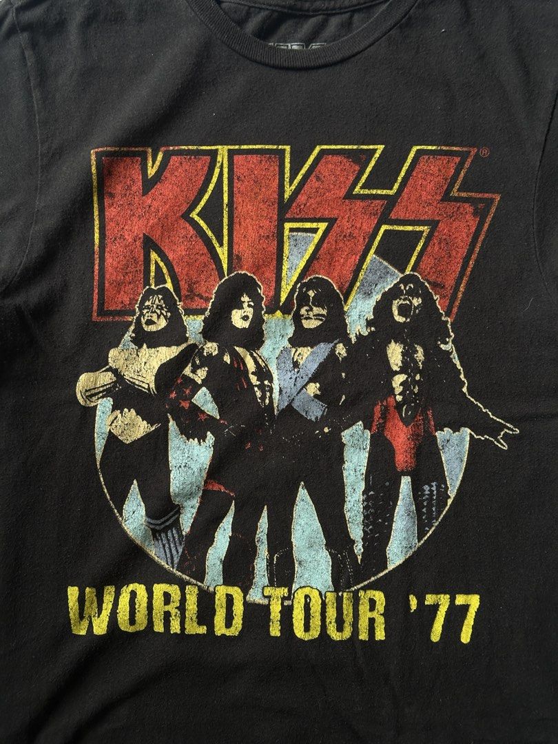 KISS BAND SHIRT (Category: Tshirts & Polo Shirts ) located in Davao. Submitted by kelsocool (Listing ID 1466255755, Image 3). Description: KISS “World Tour ‘77” Graphic Tee Dimes (inch): 26.5 - length 18 - width 7 - sleeve color rate: 9/10 good condition no issue Description: Classic KISS World Tour ‘77 front graphic on a washed black base. Solid vintage rock aesthetic, perfect for everyday streetwear layering..