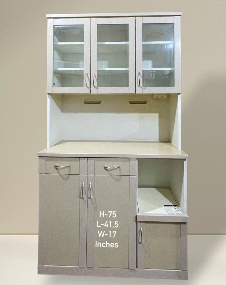 Kitchen Cupboard Display Hutch Cabinet (Category: Shelves, Cabinets & Racks) located in Quezon City. Submitted by dannikkishoppe2 (Listing ID 1466235822, Image 1). Description: Kitchen Cupboard Display Hutch Cabinet ‼️₱12000‼️ • Dimensions: approx. 75" H x 41.5" L x 17" W • Upper glass cabinets with adjustable shelves • Two convenient pull-out drawers and spacious lower cabinet space • Dedicated appliance slot with a small storage door underneath