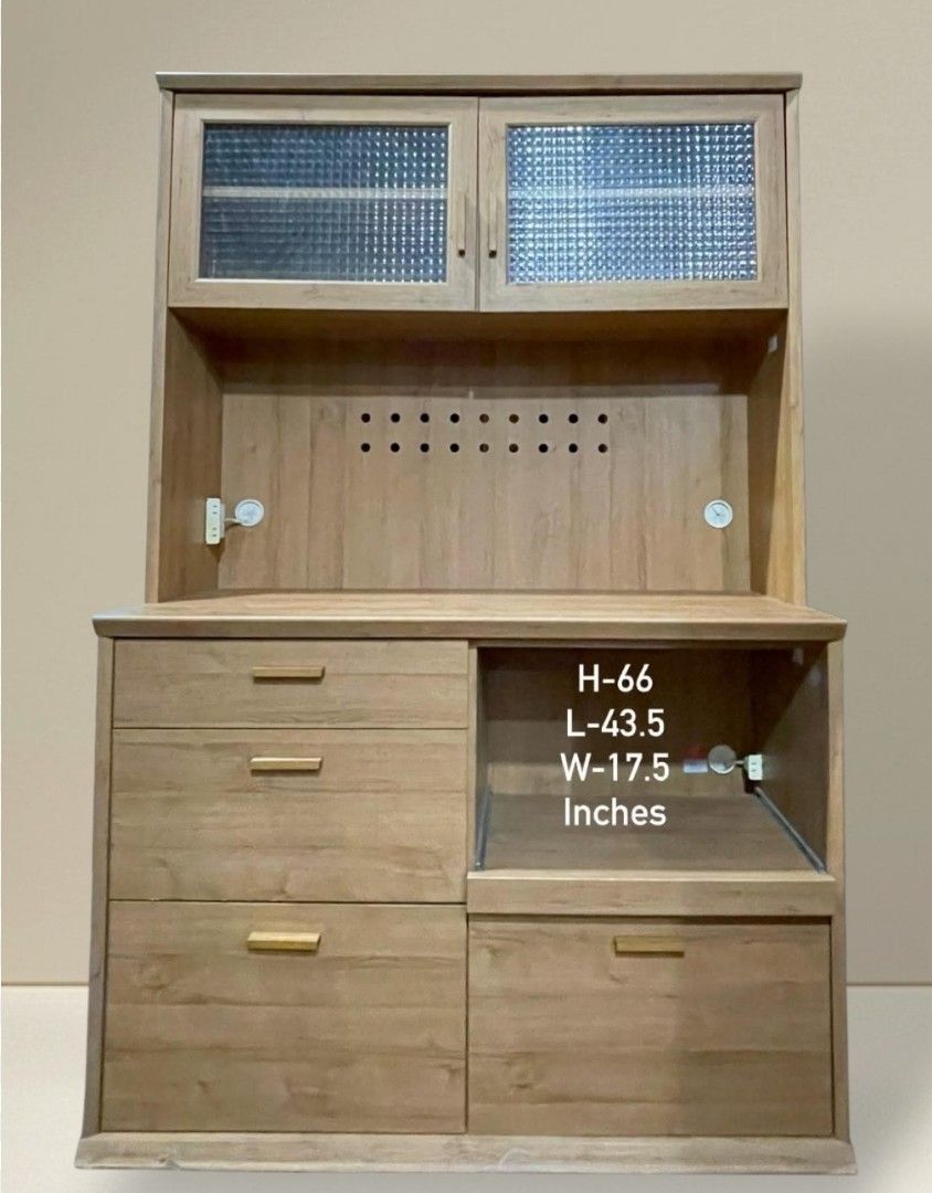 Kitchen Cupboard Hutch Cabinet (Category: Shelves, Cabinets & Racks) located in Quezon City. Submitted by dannikkishoppe2 (Listing ID 1466233562, Image 1). Description: Kitchen Cupboard Hutch Cabinet ‼️₱12000‼️ • Textured glass upper doors for a stylish display • Multiple pull-out drawers on the left for organized storage • Convenient sliding shelf compartment on the right • Middle countertop features built-in electrical outlets and ventilation h