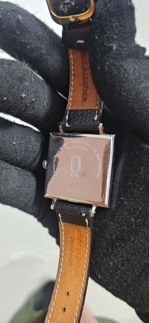 Knot Square Watch SQ-32 Himeji Leather Strap (Category: Men's Watches) located in Santa Maria. Submitted by rommelmateo (Listing ID 1466309024, Image 3). Description: - Brand/Model: Knot Square Watch (SQ-32) - Movement: Japanese movement (Battery recently replaced, works perfectly) - Dial: White dial with Arabic numerals at quarter hours, striking blue hands, and small seconds subdial - Case & Glass: Stainless steel case with scratch-resistant sa