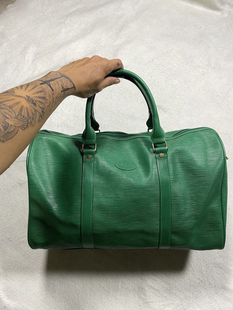 KNT Epi Leather Duffel bag (Category: Briefcases) located in Dasmarinas. Submitted by ridgeridethrift (Listing ID 1466165561, Image 2). Description: Excellent condition .