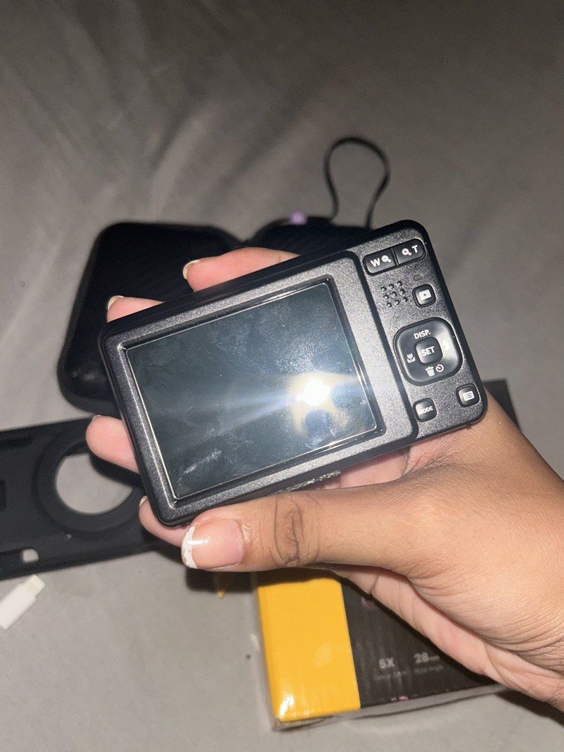 Kodak Pixpro FZ55 Digital Camera Bundle with Accessories (Category: Cameras) located in Manila. Submitted by livebird-e75c2a (Listing ID 1466211429, Image 3). Description: - Model: Kodak Pixpro FZ55 (Black) - Condition: Ready to shoot right out of the box - Features: 16MP photos, Full HD video, 5x optical zoom lens - Included: Original box, protective case, silicone sleeve, 32GB SD card, and cable - Ideal for: Travel and daily snapshots.