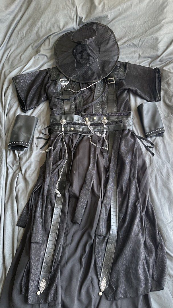 KPOP DEMON HUNTER JINU HANBOK COSTUME (Category: Sets & Coordinates) located in Alaminos. Submitted by akiinoji (Listing ID 1466178125, Image 3). Description: - Sold as set - Complete black handbok set inspired by KPOP Demon Hunter Jinu (Size M) - Includes traditional hanbok hat, textured robe with faux-leather buckles, wide waist belt with metal chains, and two wrist guards - Eye-catching metallic sheen fabric throughout for a standout look - Pe