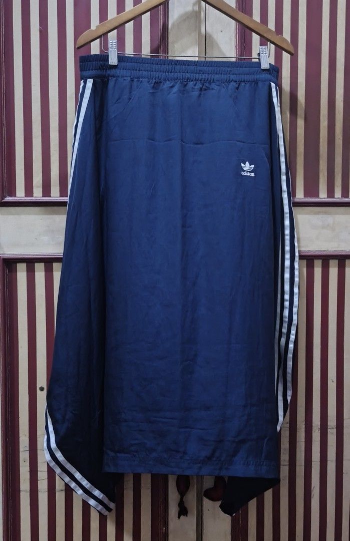(L-2XL) Adidas Navy Maxi Skirt (Category: Skirts) located in Rodriguez. Submitted by ginghamgirlie (Listing ID 1466257842, Image 2). Description: SIZE ON TAG: L BEST FITS: L-2XL MEASUREMENTS waist: 32-36 inches hips: 50 inches length: 32 inches 📌 PLEASE NOTE • Sizing is based on the actual measurements of the garment, not the tagged size. • Pre-owned pieces may differ from the tagged size due to stretching, shrinkage, wear, alterations, or label