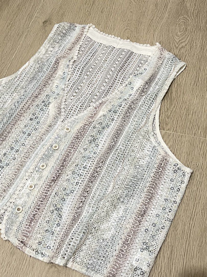 Lace Buttoned Vest (Category: Sleeveless) located in Cavite. Submitted by prlvdbydn (Listing ID 1466268333, Image 2). Description: - preloved item - bought this in ho chi minh vietnam - super nice vest to elevate basic outfits - details of the lace are so pretty!! - can fit medium to large RFS: decluttering .