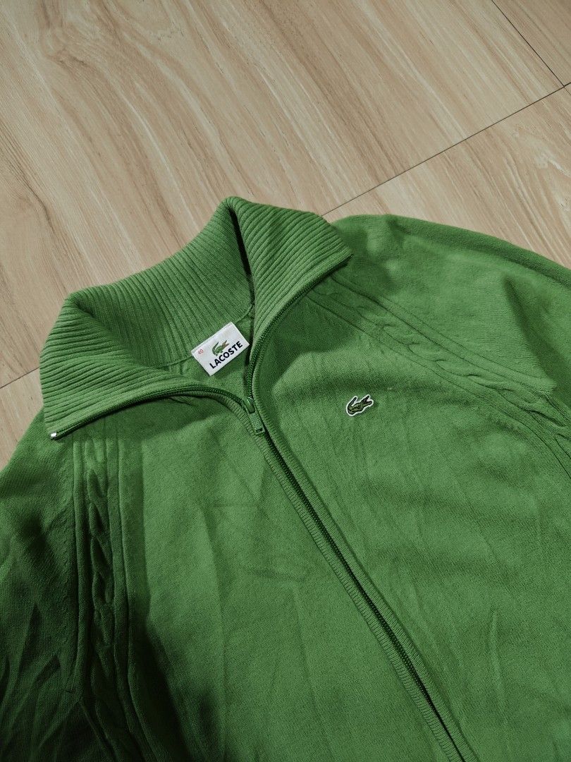 Lacoste (Category: Coats, Jackets and Outerwear) located in Mandaue City. Submitted by prekfinds (Listing ID 1466335725, Image 3). Description: Lacoste Full-zip knit cardigan As new condition 9.9/10colorate Size: 40 on tag Dimes:16.5W x 24L Featuring a stand-up collar and the classic embroidered crocodile logo on the chest. No issue.
