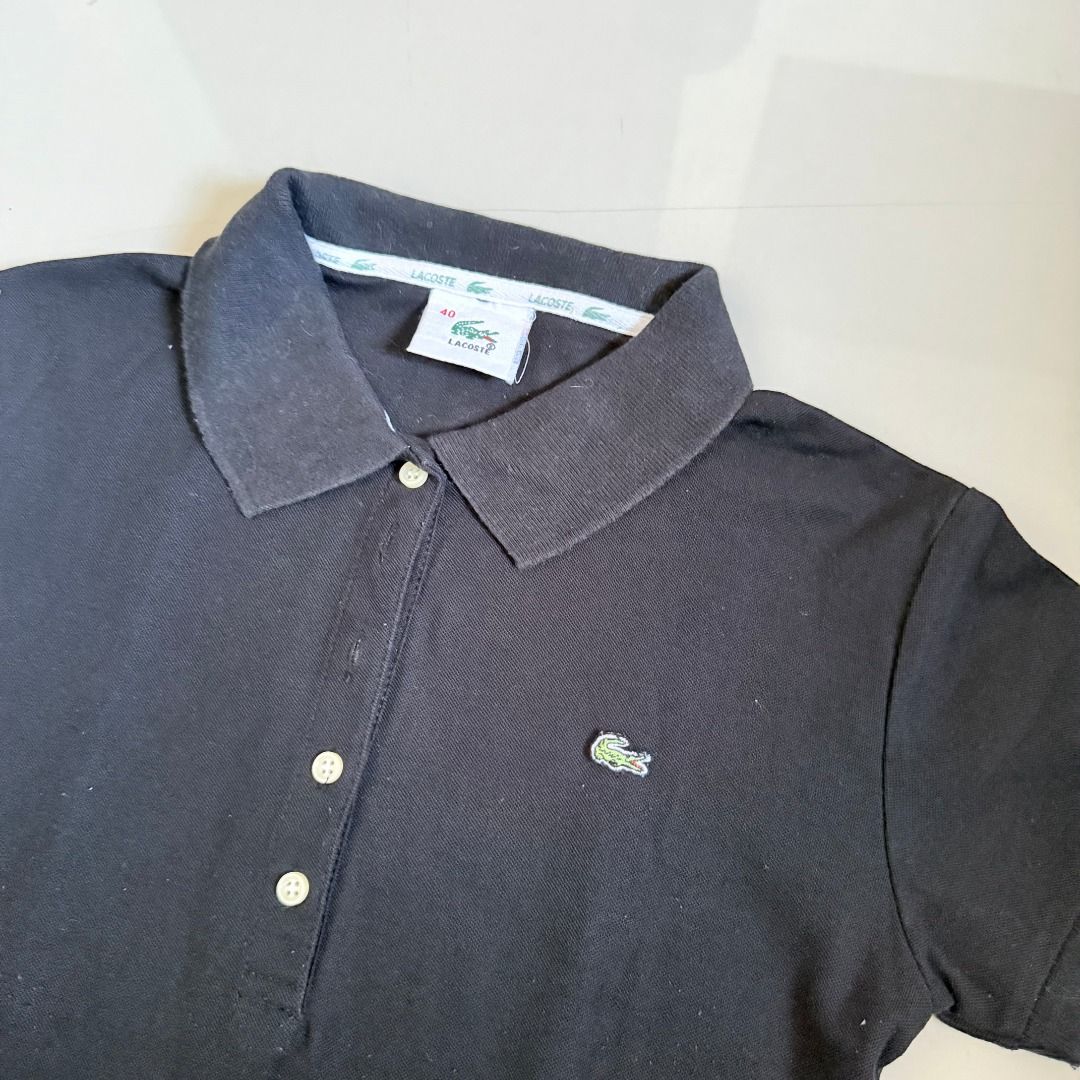 Lacoste Black Polo Shirt (Category: Tshirts & Polo Shirts ) located in Baliuag. Submitted by dubu.preloved (Listing ID 1466287146, Image 2). Description: Lacoste Black Polo Shirt - For kids but I used this as an XS girlie! - Authentic ✨ Condition: 7/10 📏 Size: XS-S 🚚 Shipping available via JNT/Flash 📍 Meet-up: Baliuag, Bulacan.