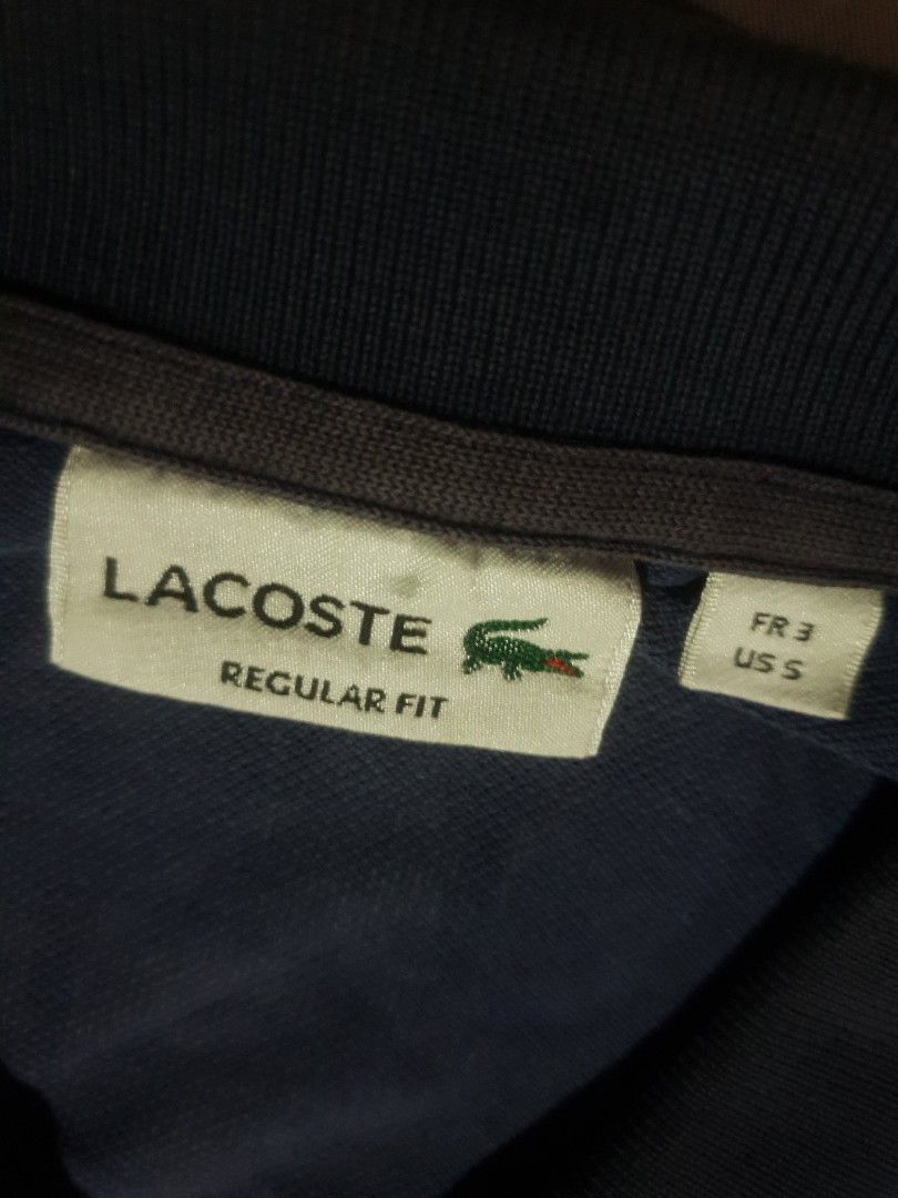 Lacoste blue polo shirt (Category: Shirts) located in San Fernando. Submitted by retro.district. (Listing ID 1466255678, Image 3). Description: - Lacoste blue poloshirt - Size: Large (21.5x30.5) - Condition: Excellent - No issue - Color Rate: 9.5/10.