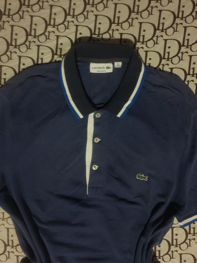 Lacoste blue polo shirt (Category: Shirts) located in San Fernando. Submitted by retro.district. (Listing ID 1466255678, Image 2). Description: - Lacoste blue poloshirt - Size: Large (21.5x30.5) - Condition: Excellent - No issue - Color Rate: 9.5/10.