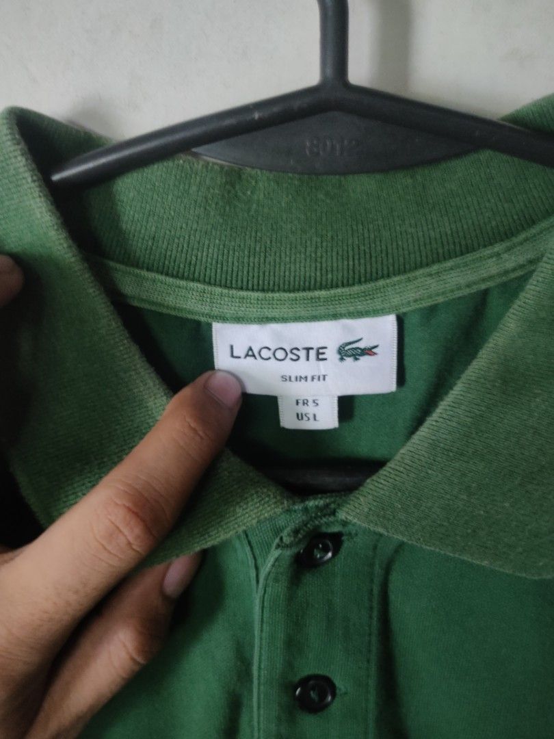 Lacoste Green Polo Shirt (Category: Tshirts & Polo Shirts ) located in Manila. Submitted by montillano25396 (Listing ID 1466280984, Image 2). Description: Lacoste Green Polo shirt Size: Large Good Condition✨ Minimal Fadings on collar only.