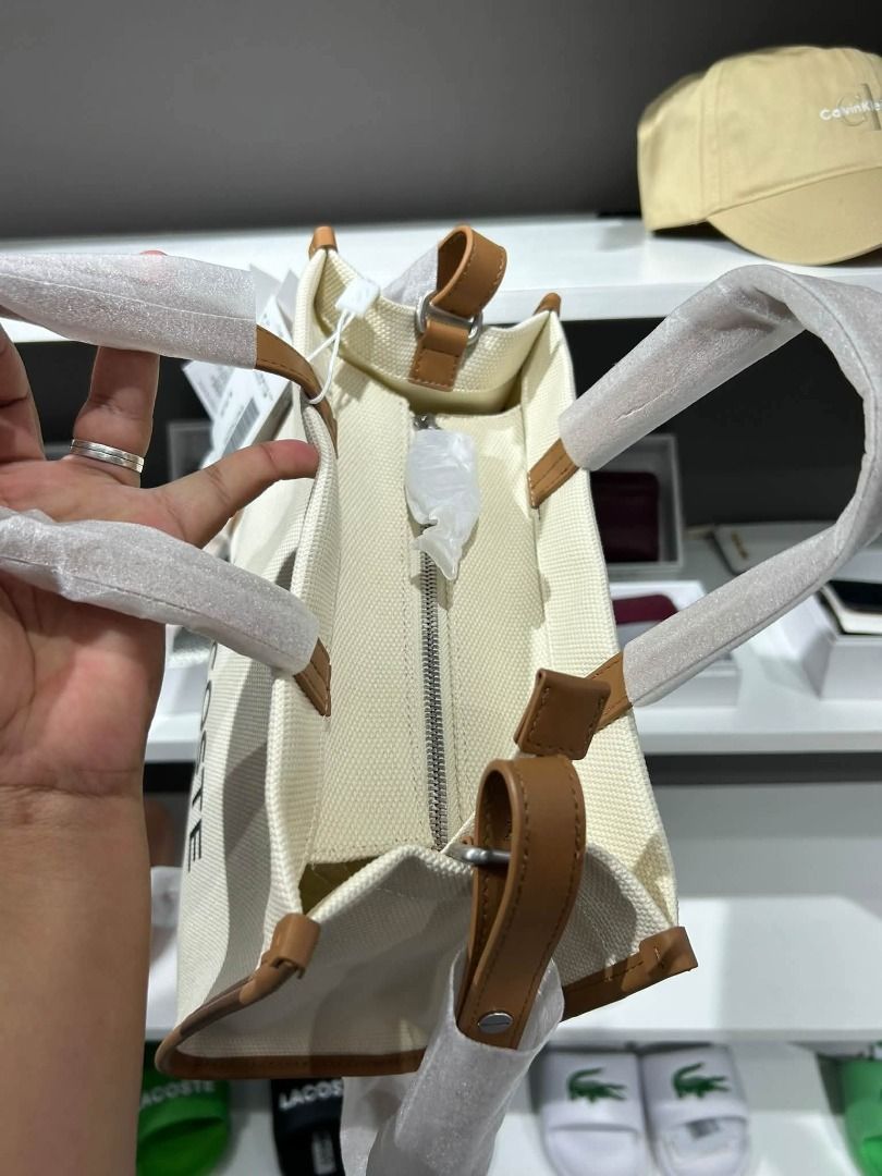 Lacoste Heritage Cotton Small Canvas (Category: Cross-body Bags) located in Rizal. Submitted by hiraya16 (Listing ID 1466334845, Image 2). Description: Available Onhand ready to ship J&T - JRS ONLY.