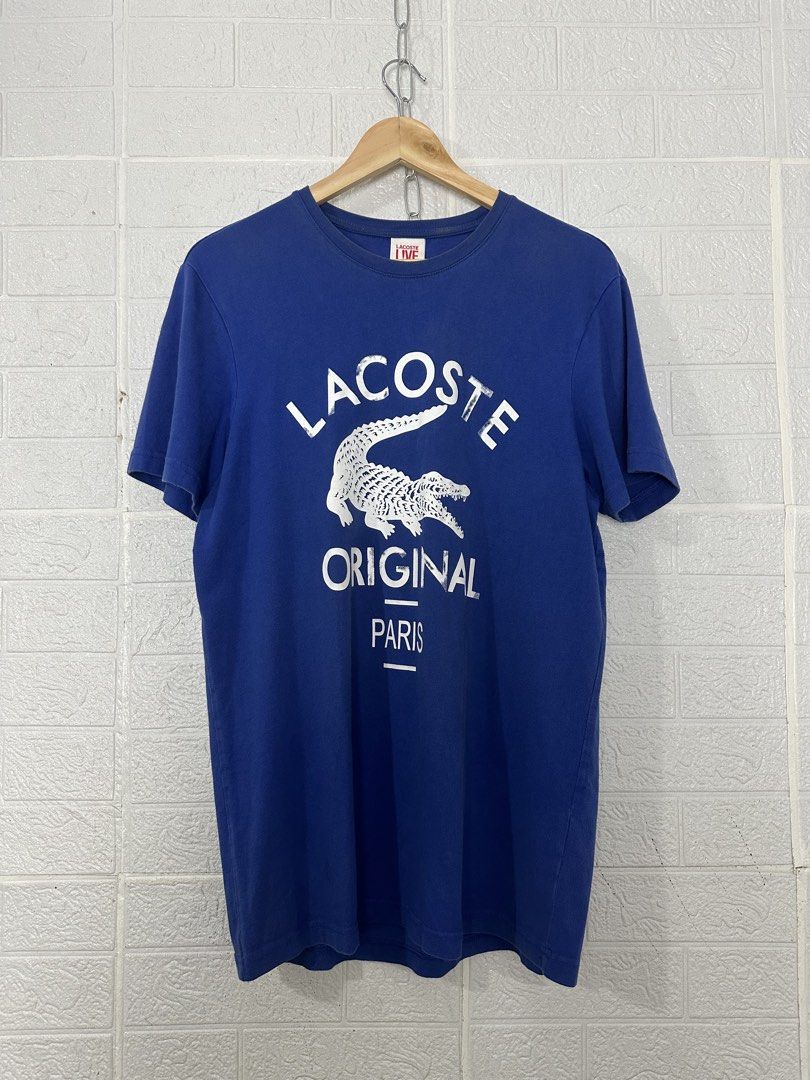 Lacoste Live “ Original Paris “ Tee (Category: Activewear) located in Bacolod City. Submitted by 2k.archives (Listing ID 1466306899, Image 1). Description: Mens / Lacoste Live “ Original Paris “ Biglogo Tee • Authentic / Original • Excellent Condition • Flaw Need Wash • Size 5 Tagged • 21 Width • 29.5 Length Dm me if interested.