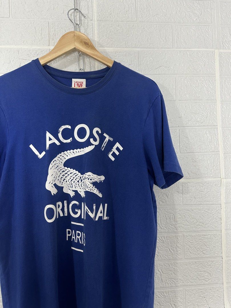 Lacoste Live “ Original Paris “ Tee (Category: Activewear) located in Bacolod City. Submitted by 2k.archives (Listing ID 1466306899, Image 2). Description: Mens / Lacoste Live “ Original Paris “ Biglogo Tee • Authentic / Original • Excellent Condition • Flaw Need Wash • Size 5 Tagged • 21 Width • 29.5 Length Dm me if interested.
