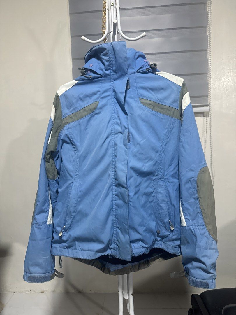 Lands' End Blue Winter Jacket Size M/P 10-12 (Category: Coats, Jackets and Outerwear) located in La Trinidad. Submitted by prelovedandfindsbyji (Listing ID 1466244403, Image 2). Description: Lands' End winter jacket in blue, white, and grey colorway. Size M/P 10-12 for kids. Hooded design with adjustable pull cords and snap button closures. Zipper front with velcro storm flap. Great outerwear piece for cold weather or snow trips. Made in Banglade