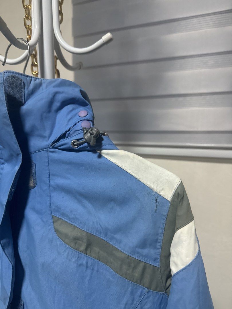 Lands' End Blue Winter Jacket Size M/P 10-12 (Category: Coats, Jackets and Outerwear) located in La Trinidad. Submitted by prelovedandfindsbyji (Listing ID 1466244403, Image 3). Description: Lands' End winter jacket in blue, white, and grey colorway. Size M/P 10-12 for kids. Hooded design with adjustable pull cords and snap button closures. Zipper front with velcro storm flap. Great outerwear piece for cold weather or snow trips. Made in Banglade