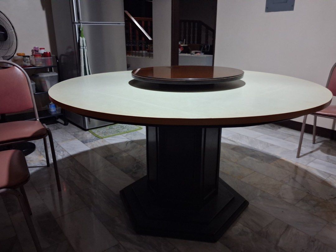 Large Round Wooden Dining Table with Lazy Susan (Category: Tables & Sets) located in Quezon City. Submitted by rmpineda (Listing ID 1466329915, Image 2). Description: Dining table with lazy susan for 6 with chairs.