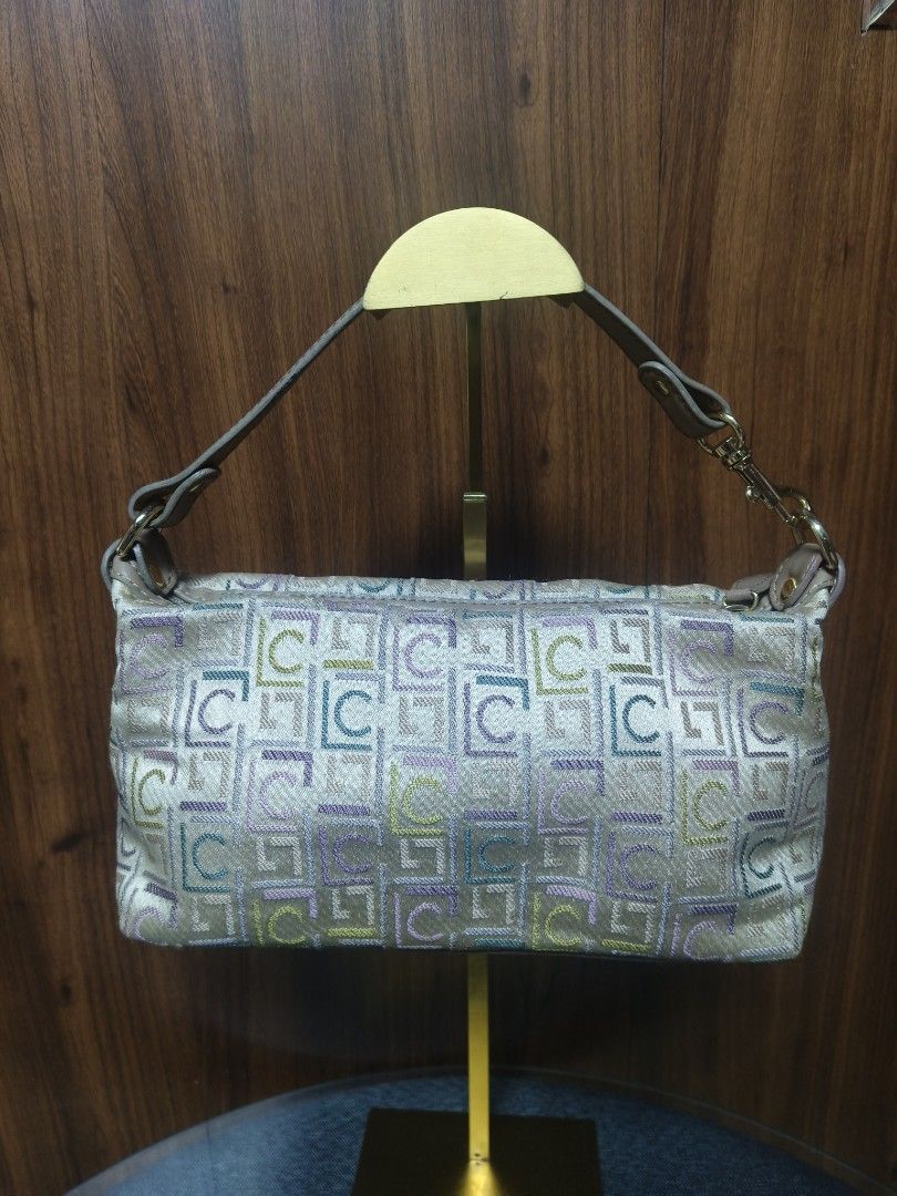 LC Multicolor Monogram Jacquard Baguette/Pouch Bag (Category: Clutches) located in Baguio. Submitted by PreiLoveMaria (Listing ID 1466308158, Image 2). Description: LC ​Multicolor Monogram Jacquard Baguette/Pouch Bag Trendy and vibrant multi-tone jacquard monogram pattern featuring pastel shades (lavender, teal, lime, and neutral tones). ​Equipped with a detachable neutral-toned shoulder strap secured by polished gold-tone metal hardware and lobs