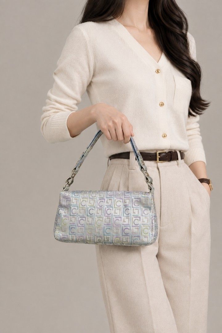 LC Multicolor Monogram Jacquard Baguette/Pouch Bag (Category: Clutches) located in Baguio. Submitted by PreiLoveMaria (Listing ID 1466308158, Image 1). Description: LC ​Multicolor Monogram Jacquard Baguette/Pouch Bag Trendy and vibrant multi-tone jacquard monogram pattern featuring pastel shades (lavender, teal, lime, and neutral tones). ​Equipped with a detachable neutral-toned shoulder strap secured by polished gold-tone metal hardware and lobs